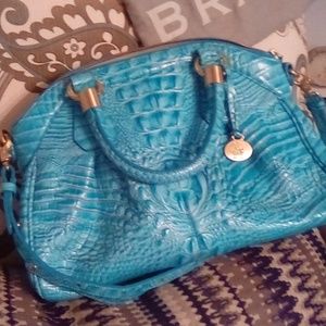 Hi I'm Sylvia! I love Brahmin bags
